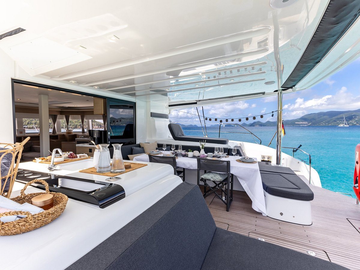 Guests dining in the cockpit of a Morii catamaran